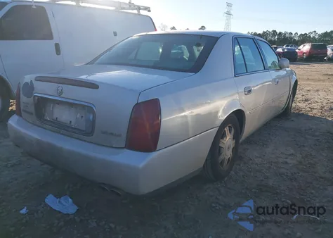 2003 Cadillac Deville Standard z USA, uszkodzony, nr VIN 1G6KD54Y13U275676
